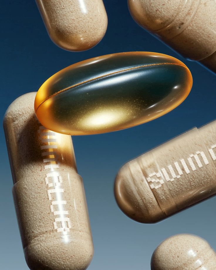 Macro study of nutrient capsules against a deep blue field